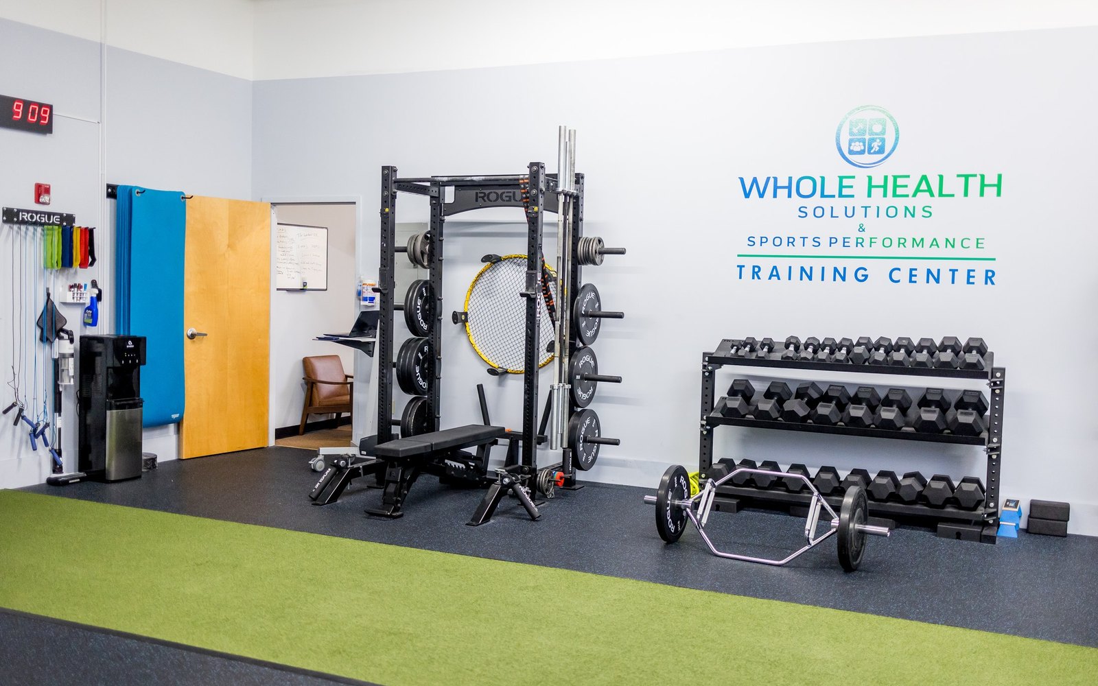 The WHS training center with racks, dumbbells and turf in Shirley, MA