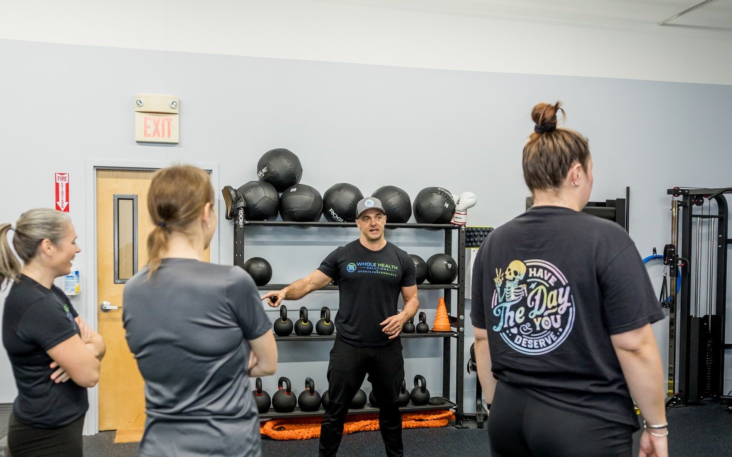 Group of clients and a coach training together at Whole Health Solutions